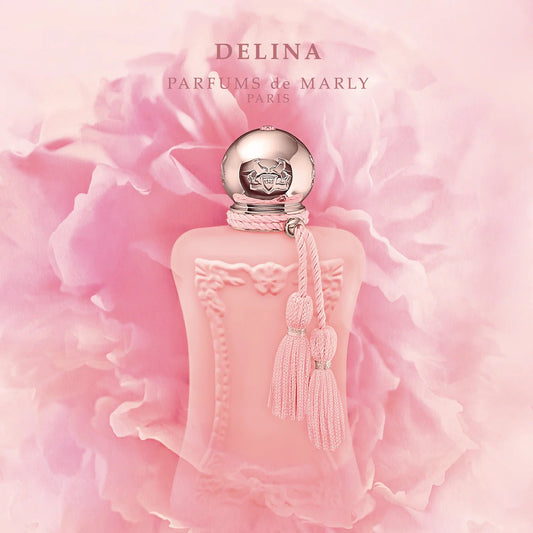 Pink Delina perfume bottle with decorative elements on a soft pink background
