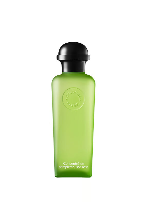 Green bottle with black cap on a white background