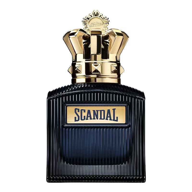 Perfume bottle with gold cap and 'Scandal' label on a white background