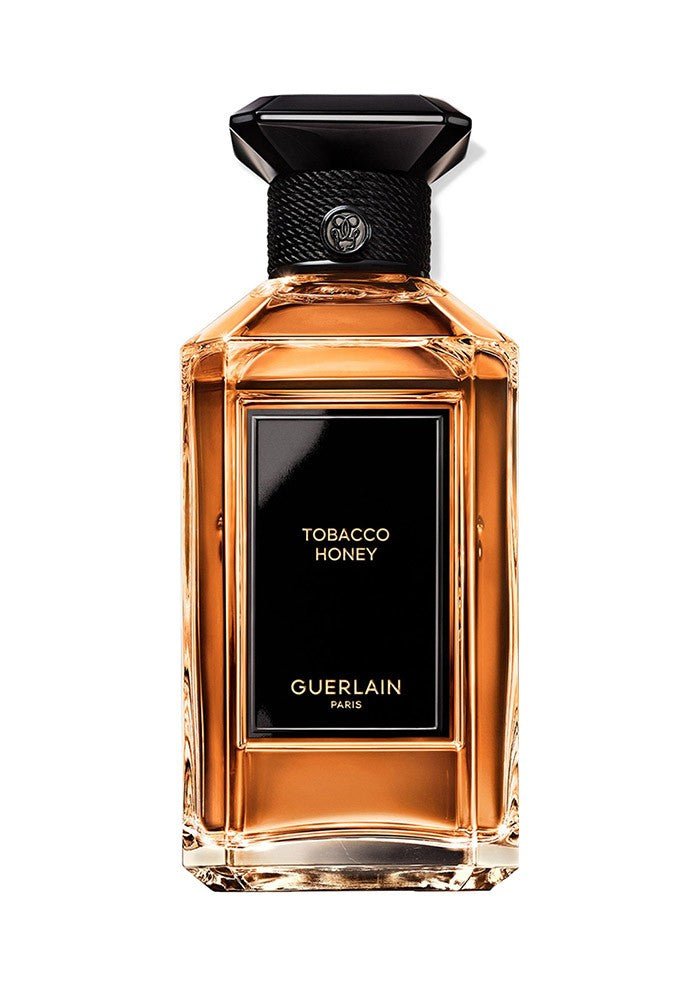 Guerlain Tobacco Honey perfume bottle on a white background