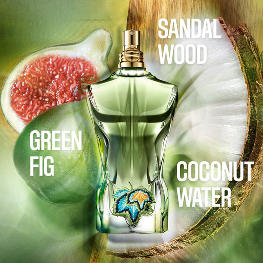 Perfume bottle with green fig, sandalwood, and coconut water elements on a green background