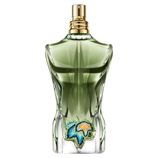 Green perfume bottle with a gold cap on a white background