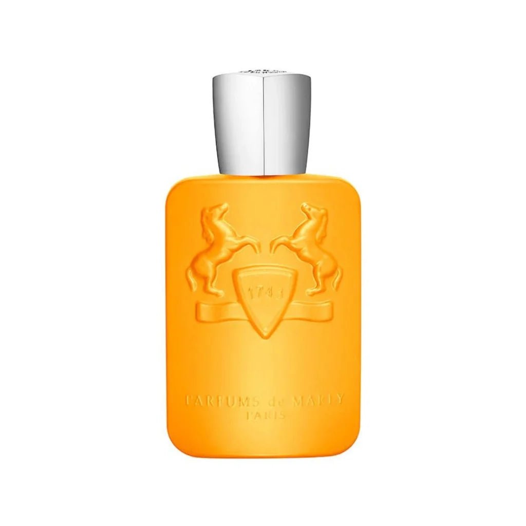Orange perfume bottle with silver cap on a white background